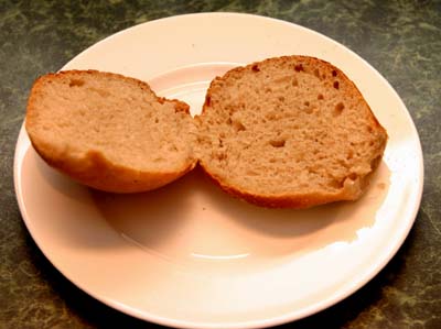 A roll split to show the crumb
                structure