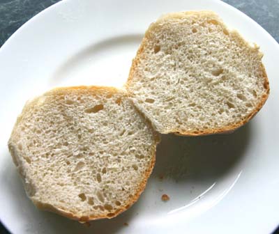 The same roll split to show the
                crumb structure